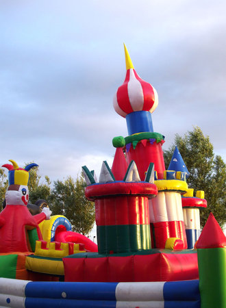 children's bouncy castle situated in a funfair.の写真素材