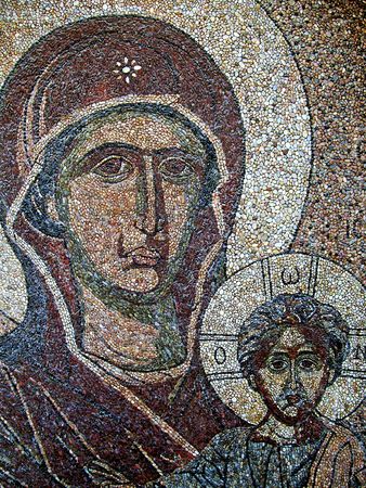 A religous mosaic on the wall of a chapel in santorini in greeceの写真素材
