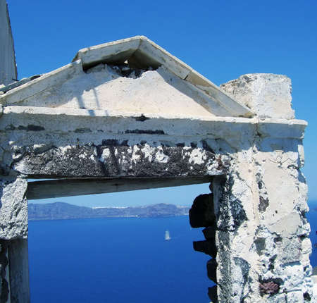 a view of the caldera from the port of fira on the greek island of santoriniの写真素材