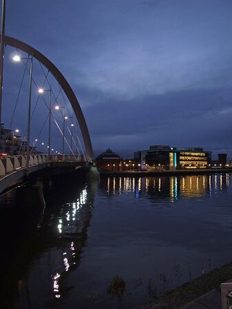 night view of the squinty bridge in glasgowの写真素材