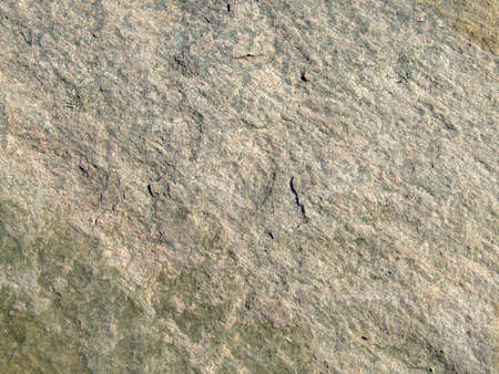 background texture of a grey rocky surfaceの写真素材