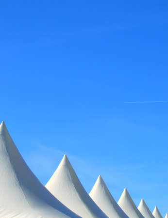 background Image of the tops of market stall tents at a local festivalの写真素材