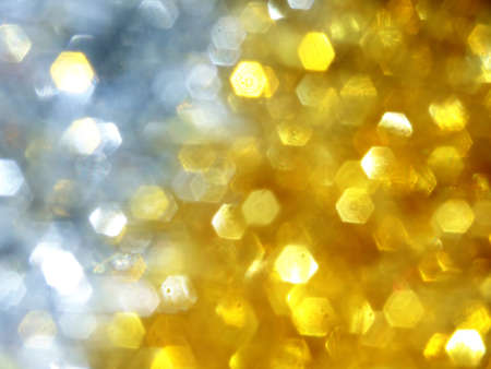 two colours of blurred tinsel that makes an abstract christmas background