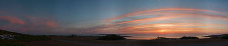 A panoramic image of the swedish coastline near Torekov at sunset.の写真素材