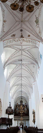 A panoramic image of the interior of a very old church or cathedral in Aarhus, Denmarkのeditorial素材