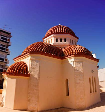 A panoramic view of a church in the town of Rethymnon on the greek island of Crete. This image has been created with the help of a bi-colour filter.の写真素材