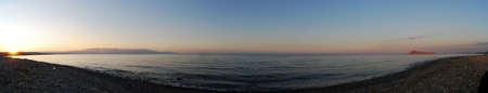 A romantic sunset panorama at the beach near Gerani on the greek island of Crete.