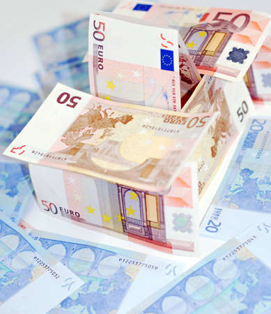 A house made from a selection of euro dollar bills.の写真素材