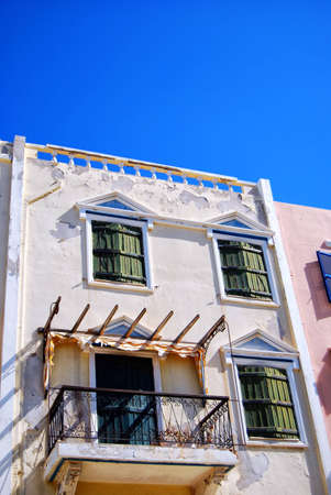 A view of an old crumbling building in the greek town of Chania.の写真素材