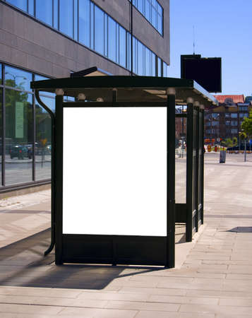 An image of a bus stop with a blank bilboard for your advertising situated in the swedish city of Malmo.の写真素材