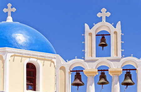 An image of a church in the santorini capital town of fira.の写真素材