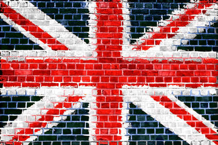 An image of the union jag flag painted on a brick wall in an urban locationの写真素材