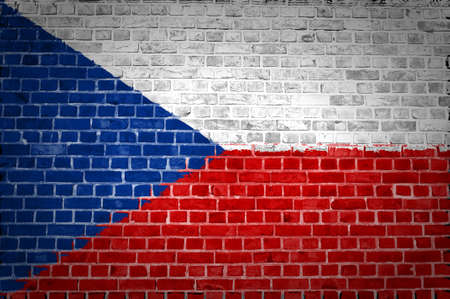 An image of the Czech Republic flag painted on a brick wall in an urban locationの写真素材