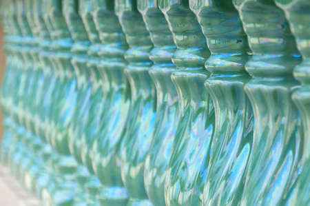 Selective focus on an ornate banister at a buddhist temple in Thailand