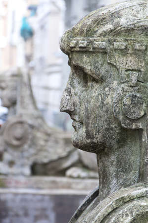 One of the many ornate statues in the art nouveau district of the latvian capital Riga の写真素材