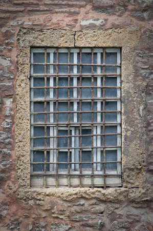 A barred window from the Hagia Irene Mosque in Istanbul, Turkey.
