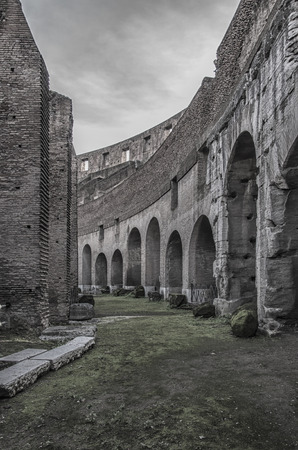A view of the impressive ancient roman colosseum situated in the Italien capital of Rome.の写真素材