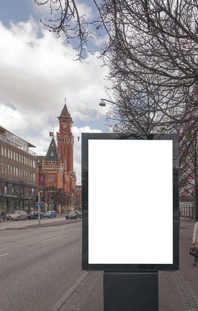 A high dynamic range image of a bus stop with a blank bilboard for your advertisingのeditorial素材