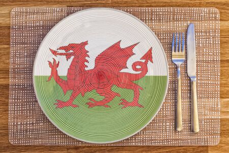 Dinner plate with the flag of Wales on it for your international food and drink concepts.の写真素材