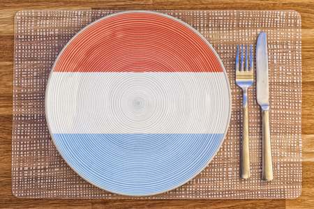Dinner plate with the flag of Luxembourg on it for your international food and drink concepts.の写真素材