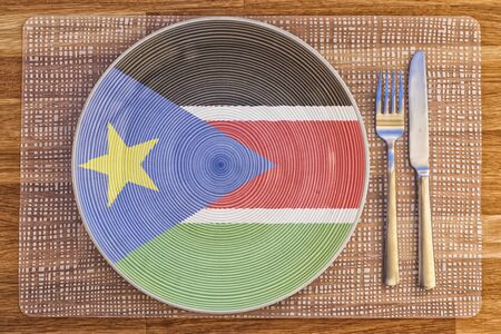 Dinner plate with the flag of South Sudan on it for your international food and drink concepts.の写真素材