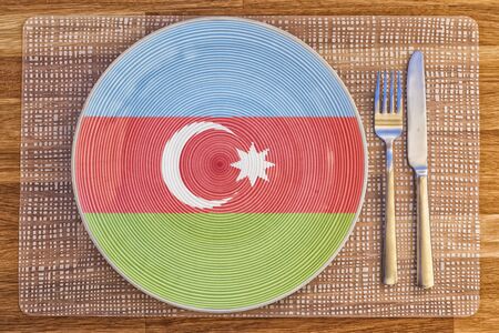 Dinner plate with the flag of Azerbaijan on it for your international food and drink concepts.の写真素材