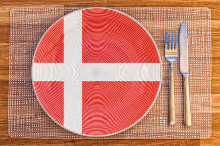 Dinner plate with the flag of Denmark on it for your international food and drink concepts.の写真素材