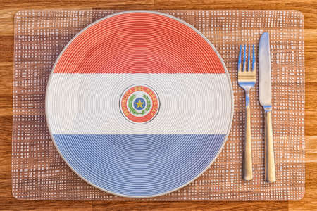 Dinner plate with the flag of Paraguay on it for your international food and drink concepts.の写真素材