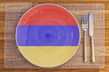Dinner plate with the flag of Armenia on it for your international food and drink concepts.の写真素材