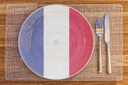 Dinner plate with the flag of France on it for your international food and drink concepts.の写真素材