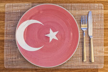 Dinner plate with the flag of Turkey on it for your international food and drink concepts.の写真素材