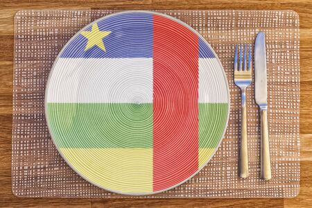 Dinner plate with the flag of the Central African Republic on it for your international food and drink concepts.の写真素材
