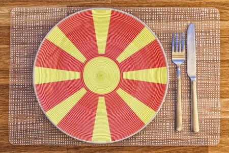Dinner plate with the flag of Macedonia on it for your international food and drink concepts.の写真素材