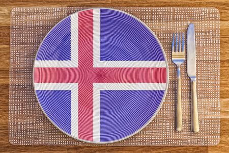 Dinner plate with the flag of Iceland on it for your international food and drink concepts.の写真素材