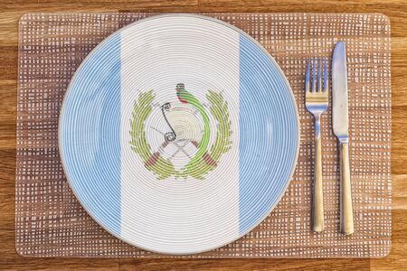 Dinner plate with the flag of Guatemala on it for your international food and drink concepts.の写真素材