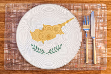 Dinner plate with the flag of Cyprus on it for your international food and drink concepts.の写真素材