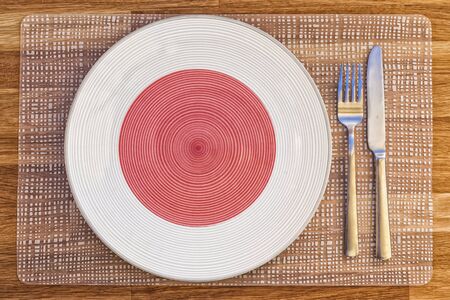 Dinner plate with the flag of Japan on it for your international food and drink concepts.の写真素材