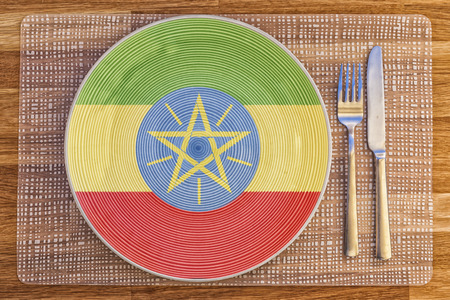 Dinner plate with the flag of Ethiopia on it for your international food and drink concepts.の写真素材