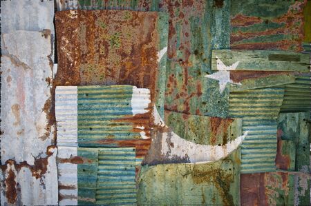 An abstract background image of the flag of Pakistan painted on to rusty corrugated iron sheets...