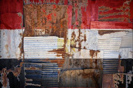 An abstract background image of the flag of Egypt painted on to rusty corrugated iron sheets...
