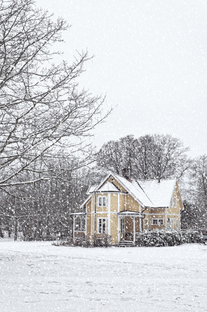 A snow covered house situated at ramlosa brunnspark on the outskirts of Helsingborg in Sweden.のeditorial素材