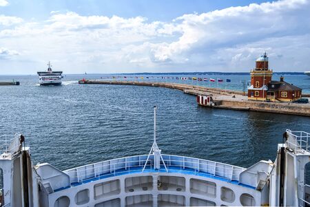 An image of a passenger ferry commuting between Helsinborg in Sweden and Helsingor in Denmark