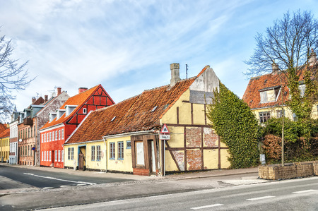 One of the many quaint little narrow streets in the old town of Helsingor in Denmark.の写真素材