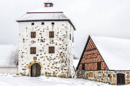 View of a snow covered Hovdala Castle in Hassleholm region. Hovdala Castle is a castle in Hassleholm Municipality, Scania, in southern Sweden.のeditorial素材