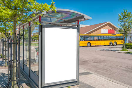 blank billboard on a bus shelter mockup with space to place your own advertisingの写真素材