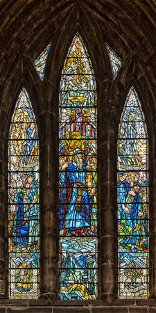 GLASGOW SCOTLAND APRIL 02, 2016: One of the many beautiful stained glass windows that adorn the Glasgow cathedral in Scotland.のeditorial素材