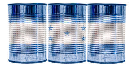Three tin cans with the flag of Honduras on them isolated on a white background.の写真素材