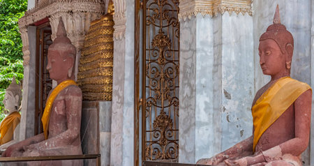 Entrance to a buddhist temple situated in the city of Phetchaburi in Thailand.の写真素材
