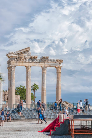 SIDE, TURKEY - OCTOBER 02, 2013: Tourists sightseeing at the ancient ruins of the temple of Apollo in Side.のeditorial素材