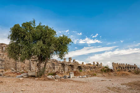 Part of the ancient city wall ruins that surround the town of Side in Turkey.の写真素材